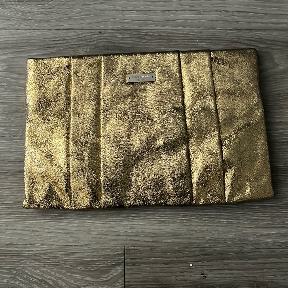 Kate Spade gold clutch.